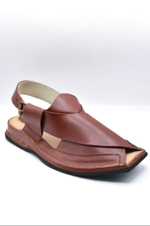 Brown sandal with a beige insole on a white background