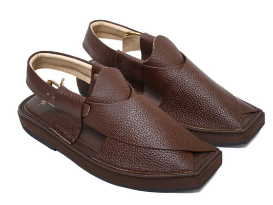 Pair of brown leather shoes on a white background