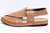 Tan sandal with a strap on a white background
